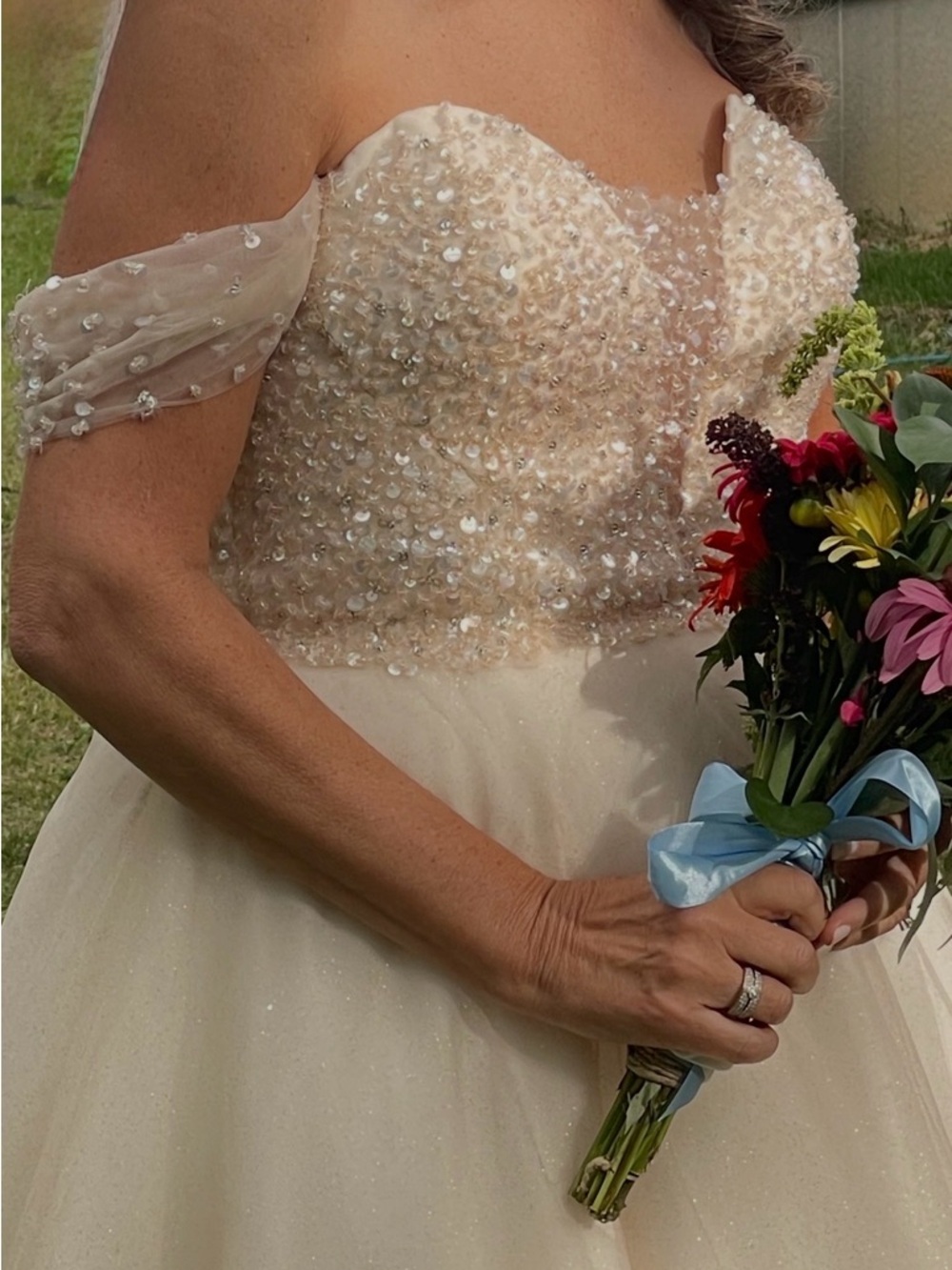 Ivory Off-Shoulder Beaded Wedding Dress, perfect for an outdoor setting